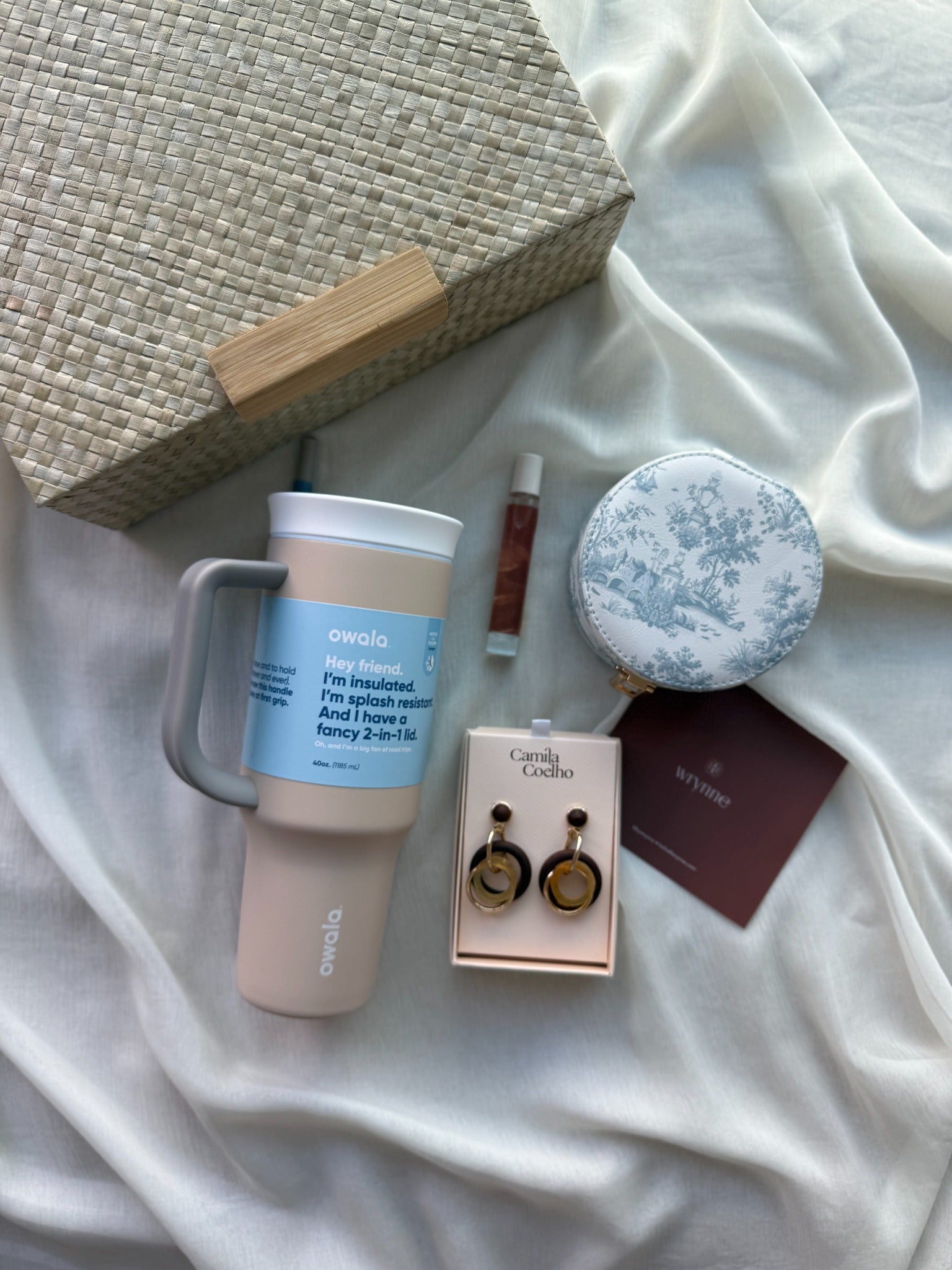 A woven Wrynne gift box with contents selected around the recipient